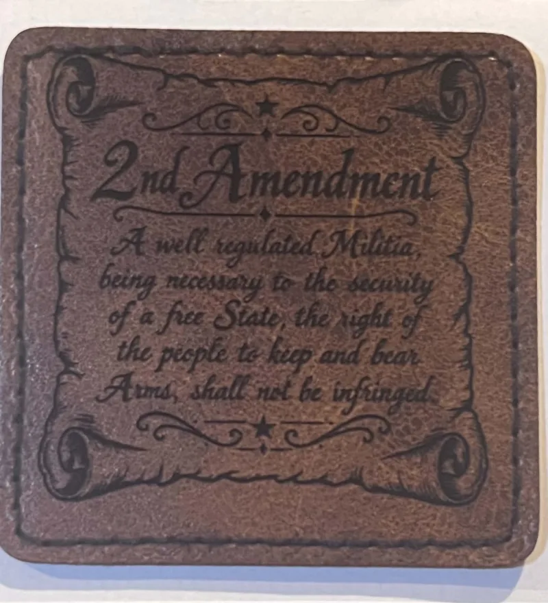 Square patch with an engraved Second Amendment design
